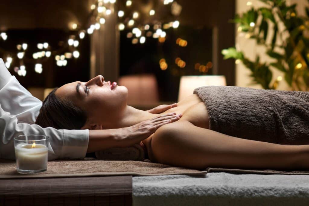 Client receiving therapeutic massage in Grand Rapids to support immune health and cold-weather wellness.