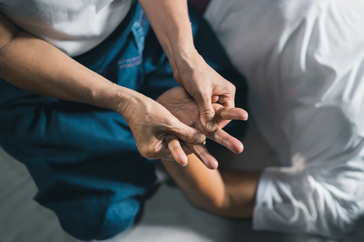 Happy woman relaxing at massage salon