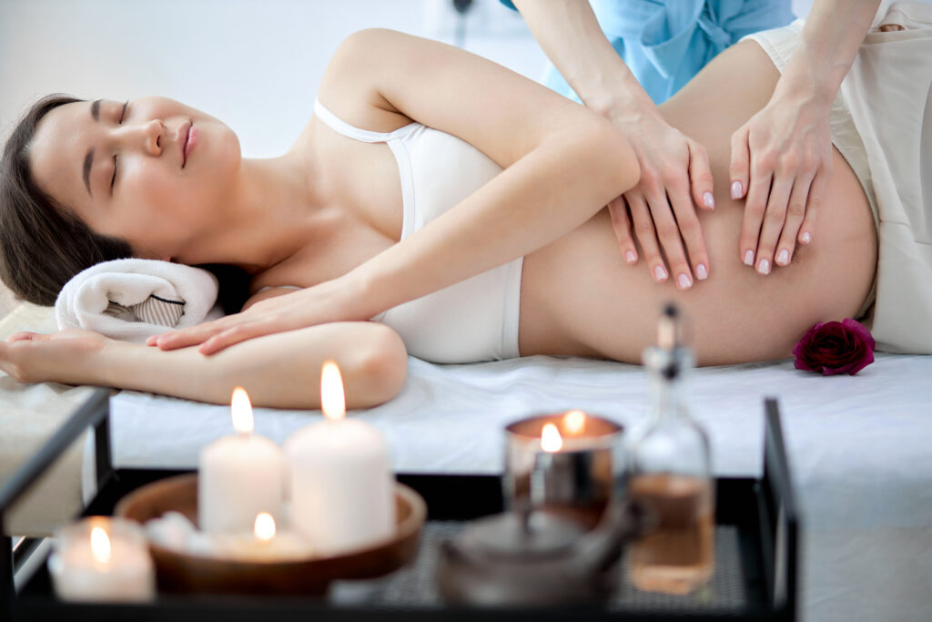 Prenatal massage therapy session supporting pregnancy comfort and relaxation