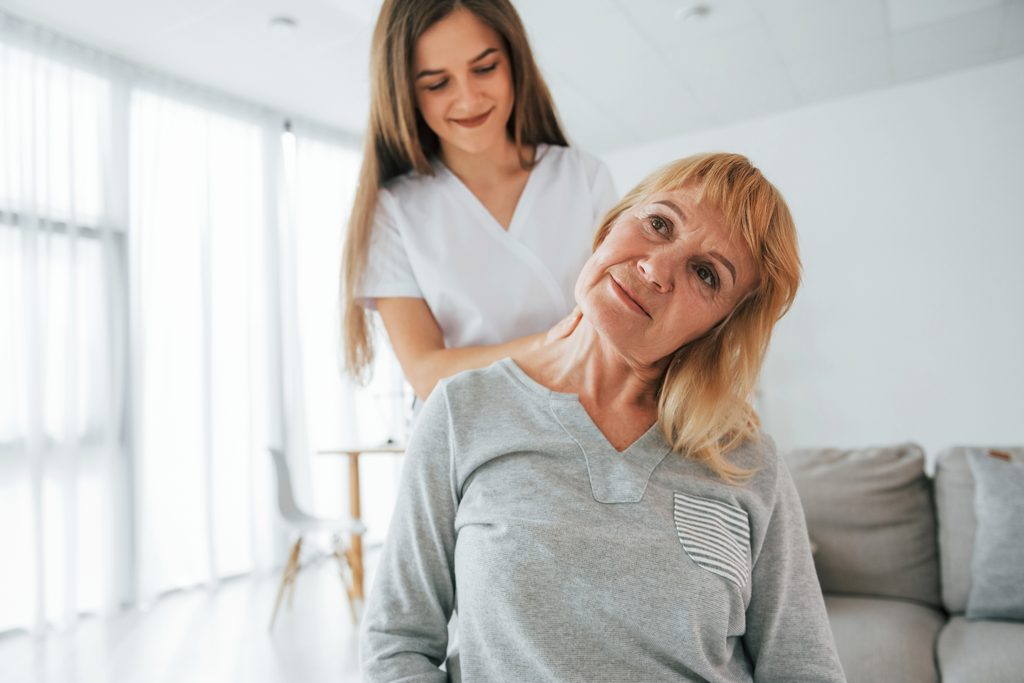 Be Balanced Bodywork mobile massage therapist providing a relaxing in-home massage for a client in Grand Rapids.